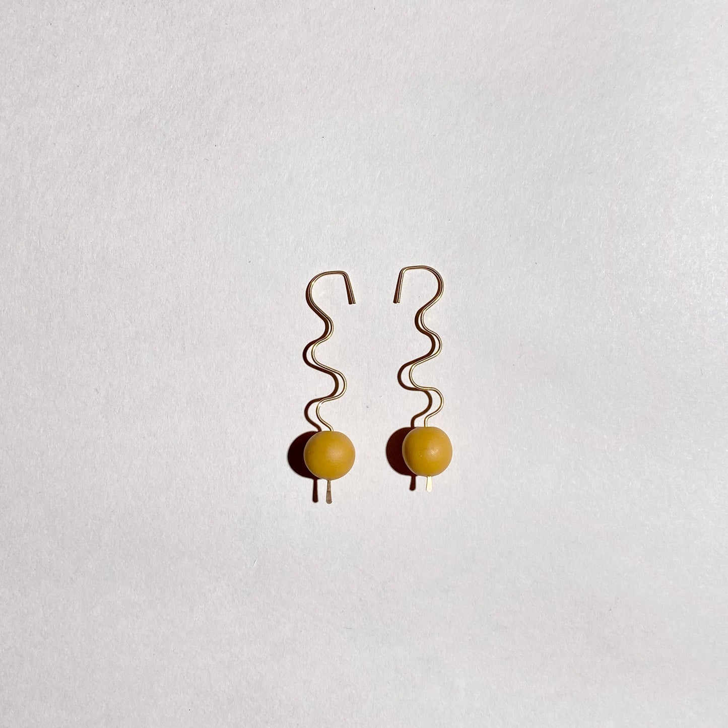 Ripple earring mustard